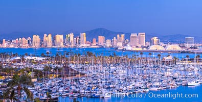 San Diego City Skyline at Sunset, viewed from Point Loma, Shelter Island Yacht Club in the foreground, San Diego Bay, Mount San Miguel (right) and Lyons Peak (left) in distance, panoramic photograph