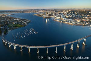 San Diego Coronado Bridge, known locally as the Coronado Bridge, links San Diego with Coronado, California.  The bridge was completed in 1969 and was a toll bridge until 2002.  It is 2.1 miles long and reaches a height of 200 feet above San Diego Bay.  Coronado Island is to the left, and downtown San Diego is to the right in this view looking north