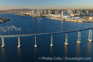 San Diego Coronado Bridge, known locally as the Coronado Bridge, links San Diego with Coronado, California.  The bridge was completed in 1969 and was a toll bridge until 2002.  It is 2.1 miles long and reaches a height of 200 feet above San Diego Bay.  Coronado Island is to the left, and downtown San Diego is to the right in this view looking north