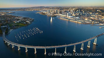 San Diego Coronado Bridge, known locally as the Coronado Bridge, links San Diego with Coronado, California.  The bridge was completed in 1969 and was a toll bridge until 2002.  It is 2.1 miles long and reaches a height of 200 feet above San Diego Bay.  Coronado Island is to the left, and downtown San Diego is to the right in this view looking north