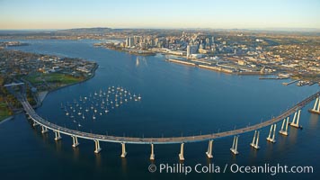 San Diego Coronado Bridge, known locally as the Coronado Bridge, links San Diego with Coronado, California.  The bridge was completed in 1969 and was a toll bridge until 2002.  It is 2.1 miles long and reaches a height of 200 feet above San Diego Bay.  Coronado Island is to the left, and downtown San Diego is to the right in this view looking north