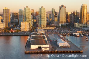 San Diego cruise ship terminal and pier, with the high rise offices of downtown San Diego rising above, along the waterfront of San Diego Bay