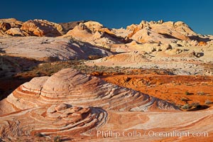 Sandstone domes and formations at sunrise.