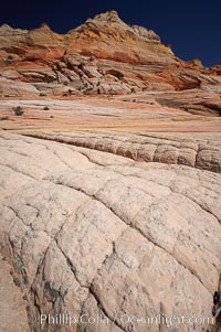 Sandstone joints.  These cracks and joints are formed in the sandstone by water that seeps into spaces and is then frozen at night, expanding and cracking the sandstone into geometric forms, North Coyote Buttes, Paria Canyon-Vermilion Cliffs Wilderness, Arizona