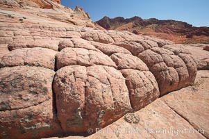 Sandstone joints.  These cracks and joints are formed in the sandstone by water that seeps into spaces and is then frozen at night, expanding and cracking the sandstone into geometric forms, North Coyote Buttes, Paria Canyon-Vermilion Cliffs Wilderness, Arizona