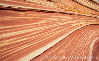 The Wave, an area of fantastic eroded sandstone featuring beautiful swirls, wild colors, countless striations, and bizarre shapes set amidst the dramatic surrounding North Coyote Buttes of Arizona and Utah.  The sandstone formations of the North Coyote Buttes, including the Wave, date from the Jurassic period. Managed by the Bureau of Land Management, the Wave is located in the Paria Canyon-Vermilion Cliffs Wilderness and is accessible on foot by permit only