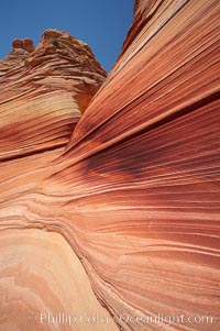 Sandstone striations.  Prehistoric sand dunes, compressed into sandstone, are now revealed in sandstone layers subject to the carving erosive forces of wind and water, North Coyote Buttes, Paria Canyon-Vermilion Cliffs Wilderness, Arizona