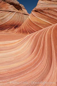 Sandstone striations.  Prehistoric sand dunes, compressed into sandstone, are now revealed in sandstone layers subject to the carving erosive forces of wind and water, North Coyote Buttes, Paria Canyon-Vermilion Cliffs Wilderness, Arizona