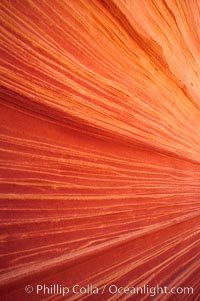 Sandstone striations.  Prehistoric sand dunes, compressed into sandstone, are now revealed in sandstone layers subject to the carving erosive forces of wind and water, North Coyote Buttes, Paria Canyon-Vermilion Cliffs Wilderness, Arizona