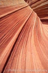 Sandstone striations.  Prehistoric sand dunes, compressed into sandstone, are now revealed in sandstone layers subject to the carving erosive forces of wind and water, North Coyote Buttes, Paria Canyon-Vermilion Cliffs Wilderness, Arizona