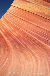 Sandstone striations.  Prehistoric sand dunes, compressed into sandstone, are now revealed in sandstone layers subject to the carving erosive forces of wind and water, North Coyote Buttes, Paria Canyon-Vermilion Cliffs Wilderness, Arizona