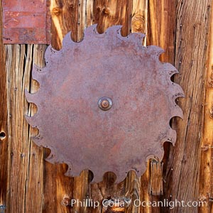 Saw blade, attached to side of the old sawmill. Bodie State Historical Park, California, USA, natural history stock photograph, photo id 23123