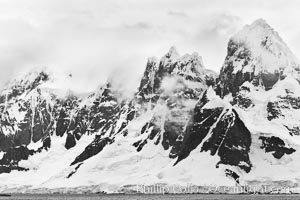 Scenery in Antarctica.  Clouds, ocean and glaciers, near Port Lockroy