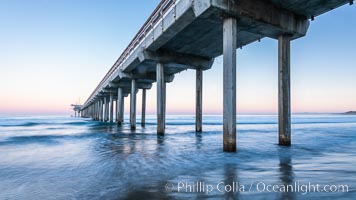 Scripps Institution of Oceanography Pier and Belt of Venus in pre-dawn light. The Earth's shadow appears as the blue just above the horizon, La Jolla, California