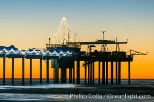 Scripps Institution of Oceanography Research Pier at sunset, with Christmas Lights and Christmas Tree, La Jolla, California