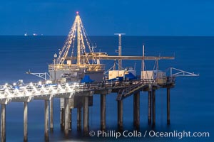 Scripps Institution of Oceanography Research Pier at dawn, with Christmas Lights and Christmas Tree, La Jolla, California