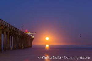Full moon sets over the Pacific Ocean, Scripps Research Pier, La Jolla