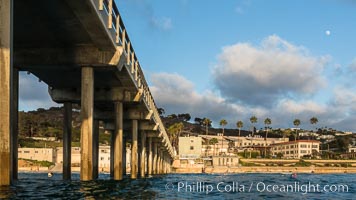 Scripps Pier, Surfer's view from among the waves. Research pier at Scripps Institution of Oceanography SIO, sunset, La Jolla, California