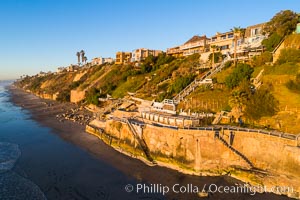 Seawalls and Crumbling Bluffs over the ocean in Encinitas, California. This will all be underwater soon