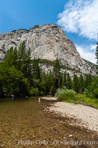 North Dome towers above the South Fork of the Kings River as it flows through Kings Canyon National Park, in the southeastern Sierra mountain range. Late summer, Sequoia Kings Canyon National Park, California