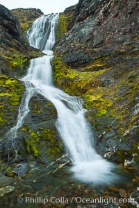 Shackleton Falls, named for explorer Sir Ernest Shackleton, formed from glacial meltwaters, near Stromness Bay, Stromness Harbour