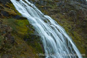 Shackleton Falls, named for explorer Sir Ernest Shackleton, formed from glacial meltwaters, near Stromness Bay, Stromness Harbour