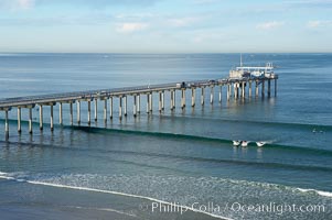 The Scripps Institution of Oceanography research pier is 1090 feet long and was built of reinforced concrete in 1988, replacing the original wooden pier built in 1915.  The Scripps Pier is home to a variety of sensing equipment above and below water that collects various oceanographic data.  The Scripps research diving facility is located at the foot of the pier.  Fresh seawater is pumped from the pier to the many tanks and facilities of SIO, including the Birch Aquarium.  The Scripps Pier is named in honor of Ellen Browning Scripps, the most significant donor and benefactor of the Institution, La Jolla, California