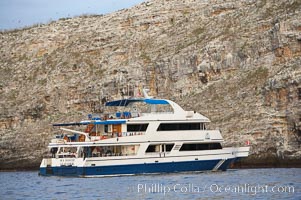 Sky Dancer, a liveaboard dive tour boat, at anchor, Wolf Island