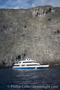 Sky Dancer, a liveaboard dive tour boat, at anchor, Wolf Island