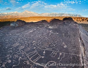 Sky Rock petroglyphs near Bishop, California.  Hidden atop on of the enormous boulders of the Volcanic Tablelands lies Sky Rock, a set of petroglyphs that face the sky.  These superb examples of native American petroglyph artwork are thought to be Paiute in origin, but little is known about them