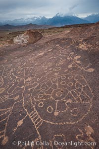 Sky Rock petroglyphs near Bishop, California.  Hidden atop on of the enormous boulders of the Volcanic Tablelands lies Sky Rock, a set of petroglyphs that face the sky.  These superb examples of native American petroglyph artwork are thought to be Paiute in origin, but little is known about them