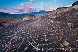 Sky Rock petroglyphs near Bishop, California.  Hidden atop an enormous boulder in the Volcanic Tablelands lies Sky Rock, a set of petroglyphs that face the sky.  These superb examples of native American petroglyph artwork are thought to be Paiute in origin, but little is known about them