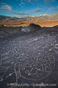 Sky Rock petroglyphs near Bishop, California.  Hidden atop on of the enormous boulders of the Volcanic Tablelands lies Sky Rock, a set of petroglyphs that face the sky.  These superb examples of native American petroglyph artwork are thought to be Paiute in origin, but little is known about them