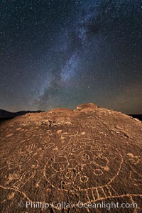 The Milky Way at Night over Sky Rock.  Sky Rock petroglyphs near Bishop, California. Hidden atop an enormous boulder in the Volcanic Tablelands lies Sky Rock, a set of petroglyphs that face the sky. These superb examples of native American petroglyph artwork are thought to be Paiute in origin, but little is known about them