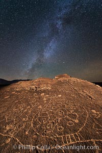 The Milky Way at Night over Sky Rock.  Sky Rock petroglyphs near Bishop, California. Hidden atop an enormous boulder in the Volcanic Tablelands lies Sky Rock, a set of petroglyphs that face the sky. These superb examples of native American petroglyph artwork are thought to be Paiute in origin, but little is known about them