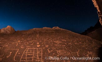 Sunset and stars over Sky Rock.  Sky Rock petroglyphs near Bishop, California. Hidden atop an enormous boulder in the Volcanic Tablelands lies Sky Rock, a set of petroglyphs that face the sky. These superb examples of native American petroglyph artwork are thought to be Paiute in origin, but little is known about them