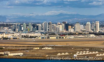 Snow-covered Mount Laguna and San Diego City Skyline at Sunset, viewed from Point Loma, panoramic photograph