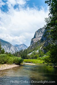 The South Fork of the Kings River flows through Kings Canyon National Park, in the southeastern Sierra mountain range. Grand Sentinel, a huge granite monolith, is visible on the right above pine trees. Late summer, Sequoia Kings Canyon National Park, California