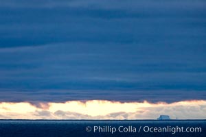 Clouds, weather and light mix in neverending forms over the open ocean of Scotia Sea, in the Southern Ocean