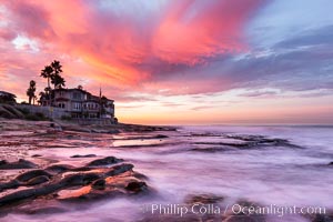 A fiery sunrise explodes over the La Jolla coastline