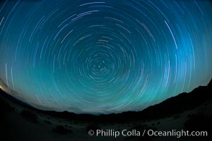 Star trails, rotating around the North Star (Polaris), seen from Death Valley.