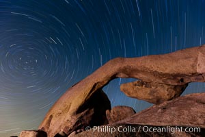 Star trails and Arch Rock, Joshua Tree National Park.