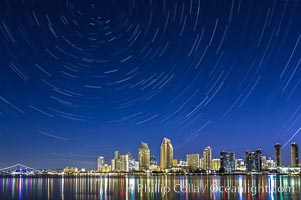 Star Trails over the San Diego Downtown City Skyline.  In this 60 minute exposure, stars create trails through the night sky over downtown San Diego