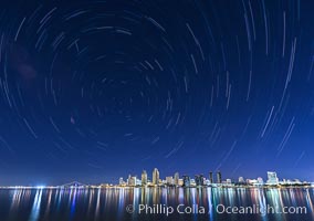 Star Trails over the San Diego Downtown City Skyline.  In this 60 minute exposure, stars create trails through the night sky over downtown San Diego. California, USA, natural history stock photograph, photo id 28385