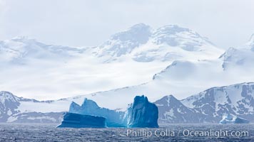 Coronation Island, is the largest of the South Orkney Islands, reaching 4,153' (1,266m) above sea level.  While it is largely covered by ice, Coronation Island also is home to some tundra habitat, and is inhabited by many seals, penguins and seabirds.