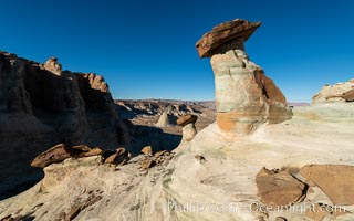 Pedestal rock, or hoodoo, at Stud Horse Point. These hoodoos form when erosion occurs around but not underneath a more resistant caprock that sits atop of the hoodoo spire. Stud Horse Point is a spectacular viewpoint on a mesa overlooking the Arizona / Utah border, Page