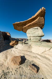 Pedestal rock, or hoodoo, at Stud Horse Point. These hoodoos form when erosion occurs around but not underneath a more resistant caprock that sits atop of the hoodoo spire. Stud Horse Point is a spectacular viewpoint on a mesa overlooking the Arizona / Utah border, Page