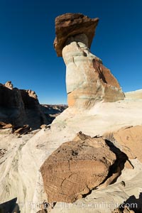 Pedestal rock, or hoodoo, at Stud Horse Point. These hoodoos form when erosion occurs around but not underneath a more resistant caprock that sits atop of the hoodoo spire. Stud Horse Point is a spectacular viewpoint on a mesa overlooking the Arizona / Utah border.