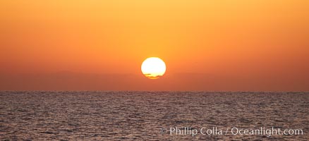 The sun rises over the Pacific Ocean offshore of California, Santa Barbara Island