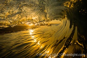 Sunrise breaking wave, dawn surf, The Wedge, Newport Beach, California